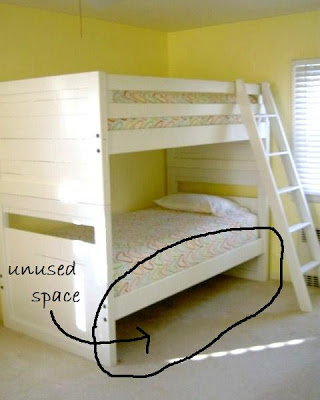 bunk beds with unused underbed space