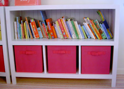 painted free standing bookshelves with storage bins
