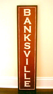 handpainted town name sign