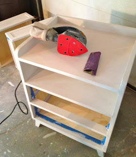primer applied to wood nightstand