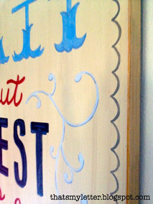 detail of handpainted wood sign