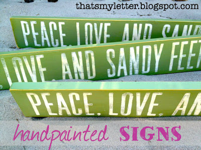 handpainted sandy feet sign
