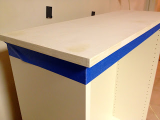 painted plywood top on kitchen cabinet