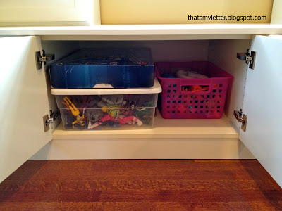 Ikea cabinet built ins with toy storage bench