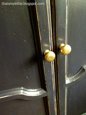 brass knobs on armoire