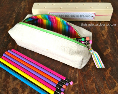 pencils inside boxy zippered pouch