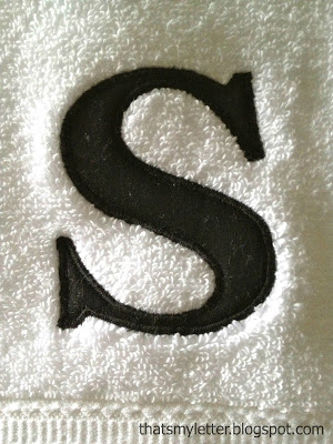 single letter monogram on terry towel