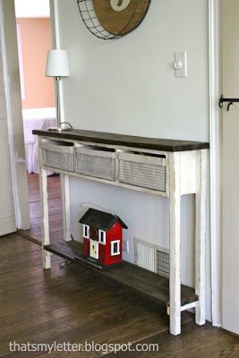 skinny console table with wire baskets