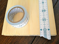 measure it tape on wood board