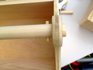 small wood dowel to keep handle in position
