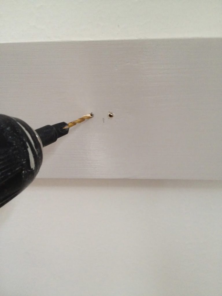 predrill holes for hook screws