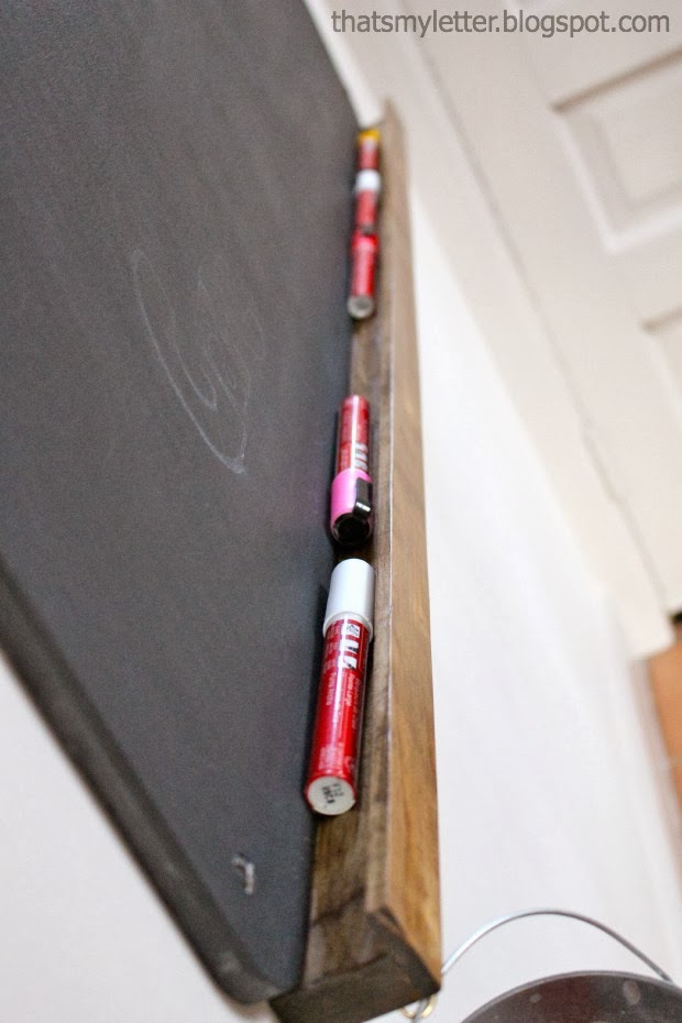 chalkboard with storage ledge