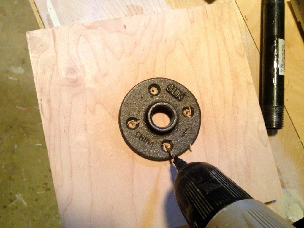 predrill holes for attaching flange to plywood