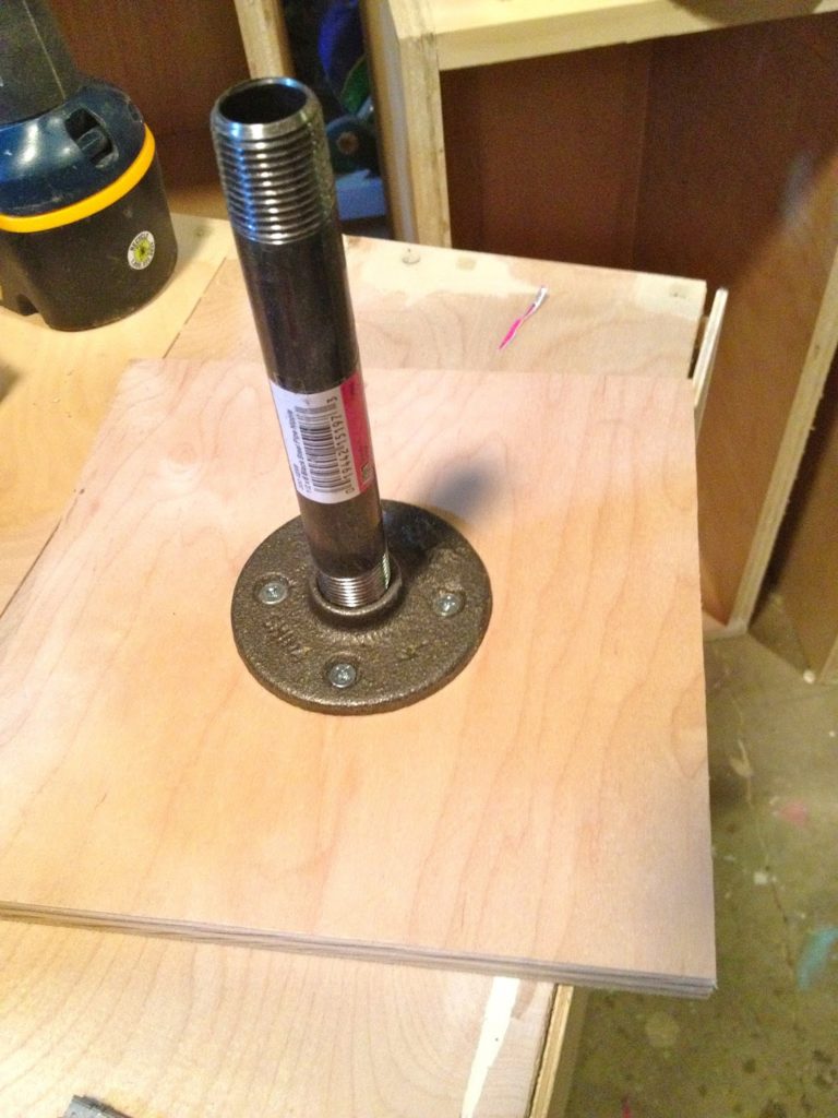 screw pipe into flange base
