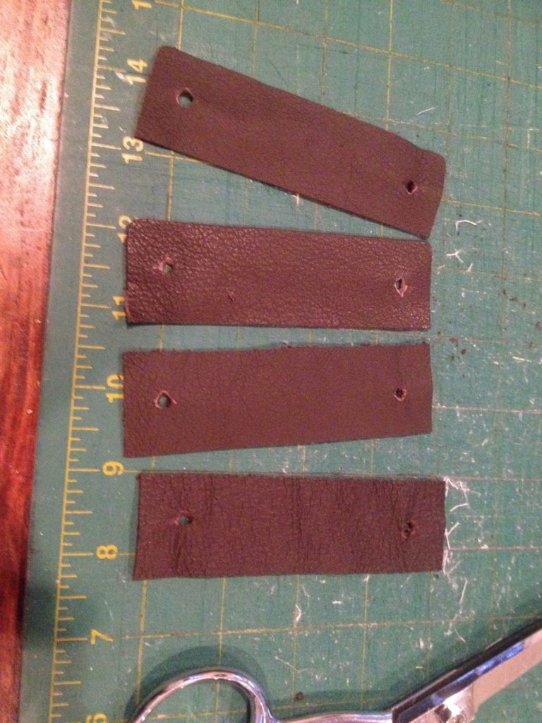 holes in leather pulls