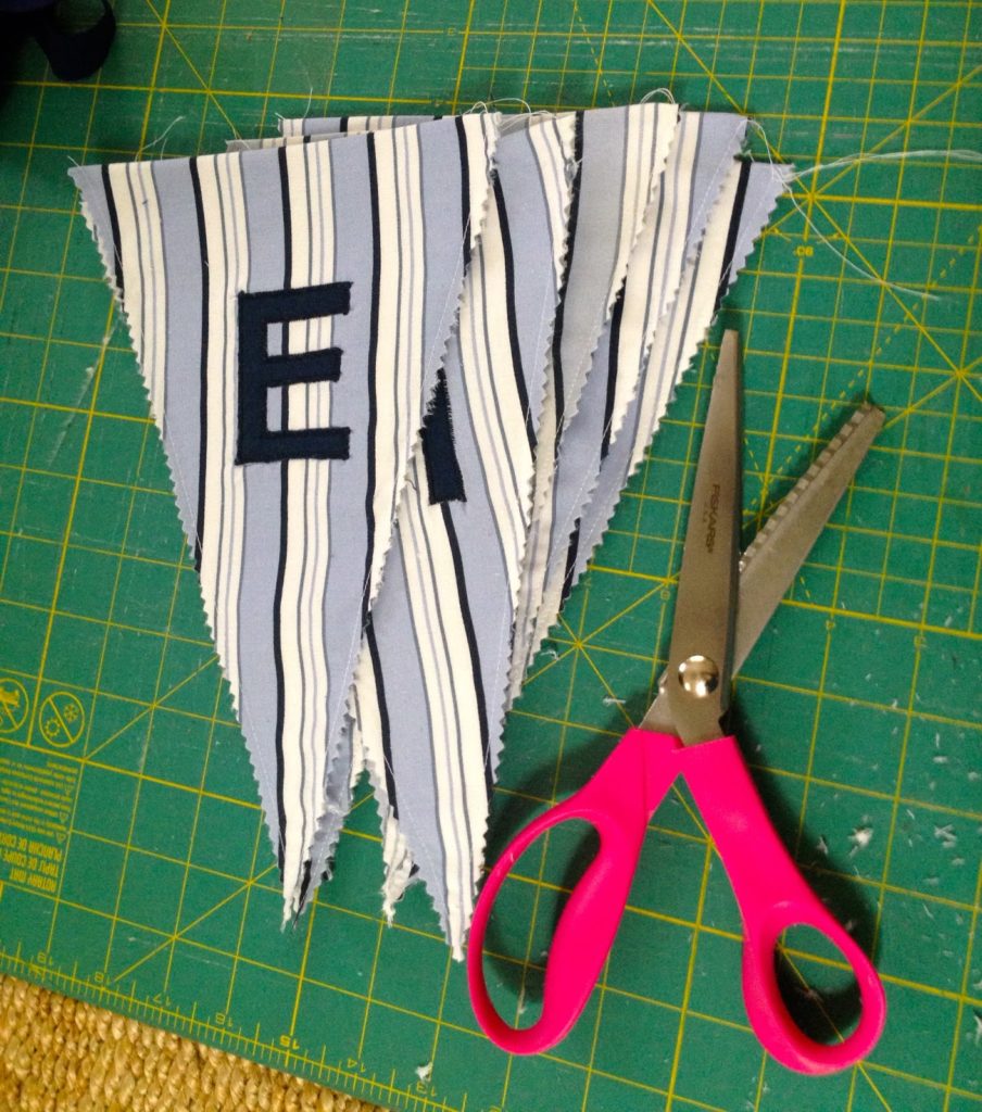 trim edges with pinking shears