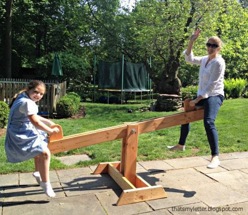 kid and adult size see saw