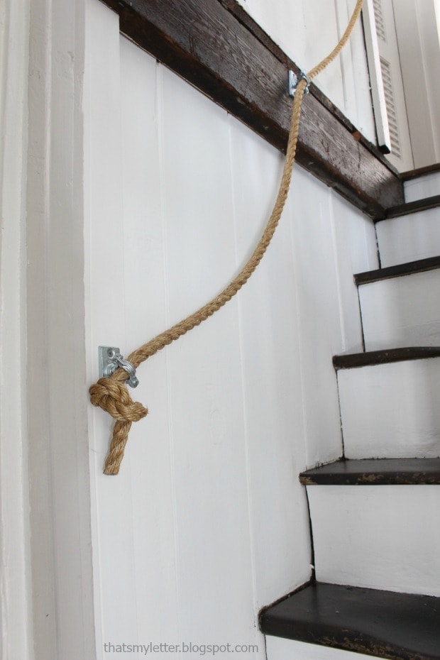 steep staircase rope handrail