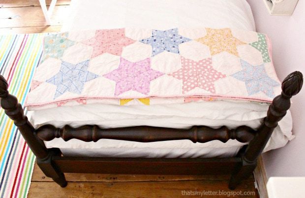 vintage quilt on girls bed
