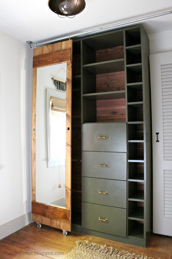 walk-in closet makeover with sliding mirror