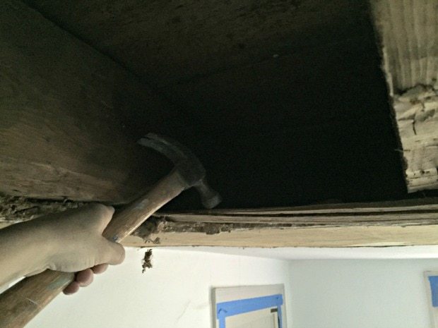 using hammer from above to remove plaster and lath ceiling