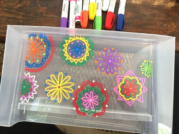 how to paint designs onto plastic bins using Sharpie paint markers