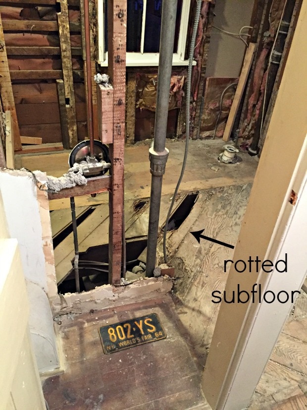 bathroom demo with rotted subfloor