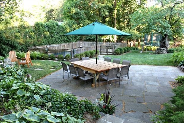 backyard patio trestle style dining table