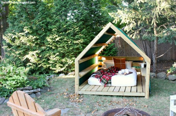 outdoor lounge cabana with fabric awning