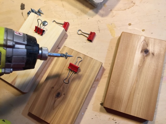 lath screw to attach binder clip to wood