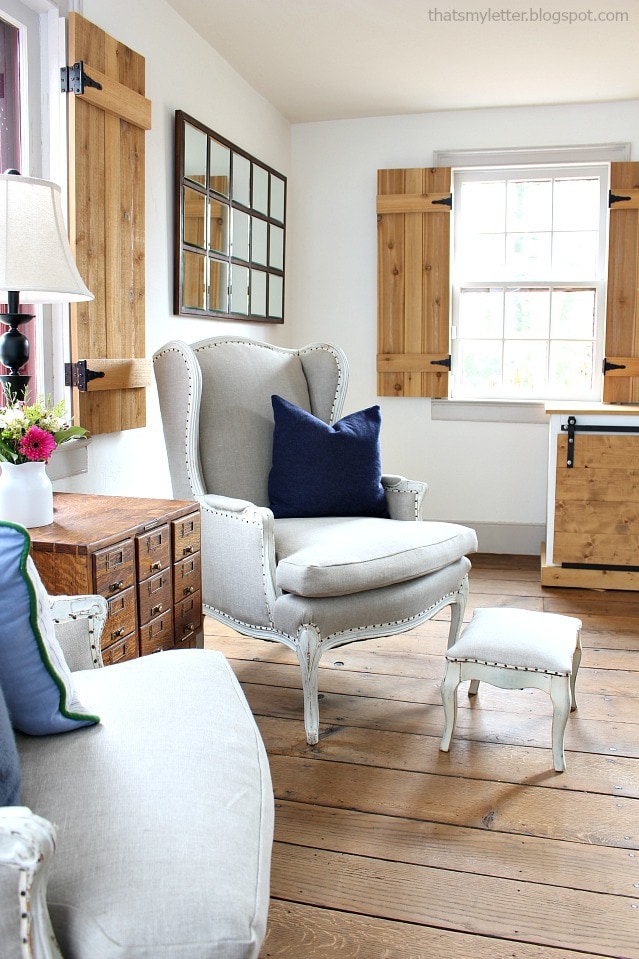 linen wing chairs in living room