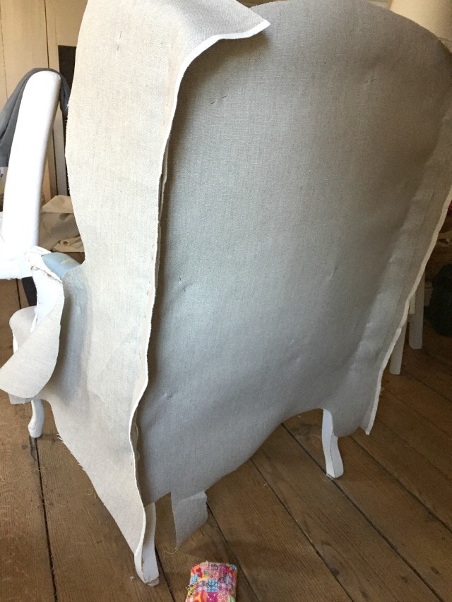 pin side seams of fabric on wing chair