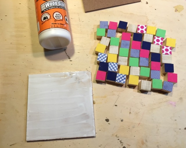 wood quilt squares onto plywood backing