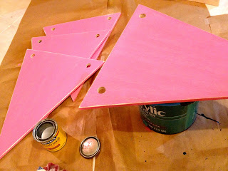 painted scrap wood triangles