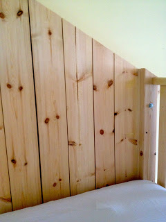 clubhouse bed back wall