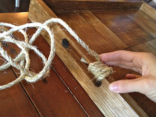 wrapping rope around the tray handle