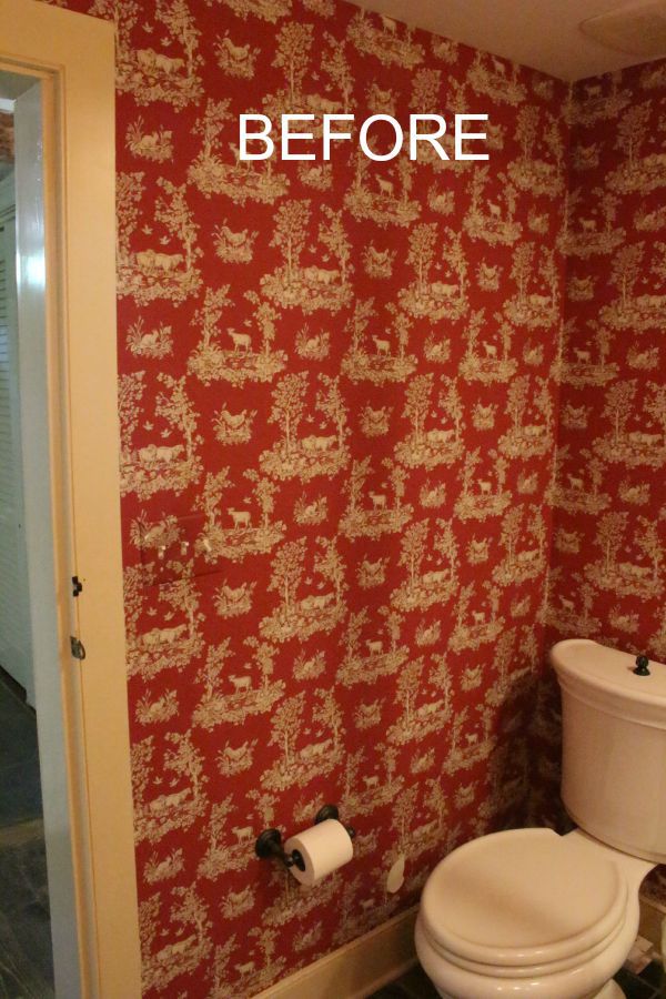 red toile wallpaper in bathroom