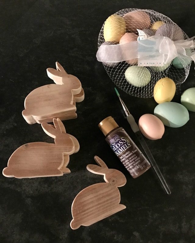 painting wood bunnies and plastic eggs