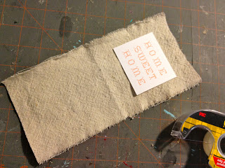tape cardstock onto drop cloth