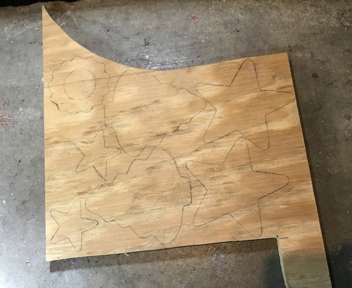 trace cookie cutters onto plywood