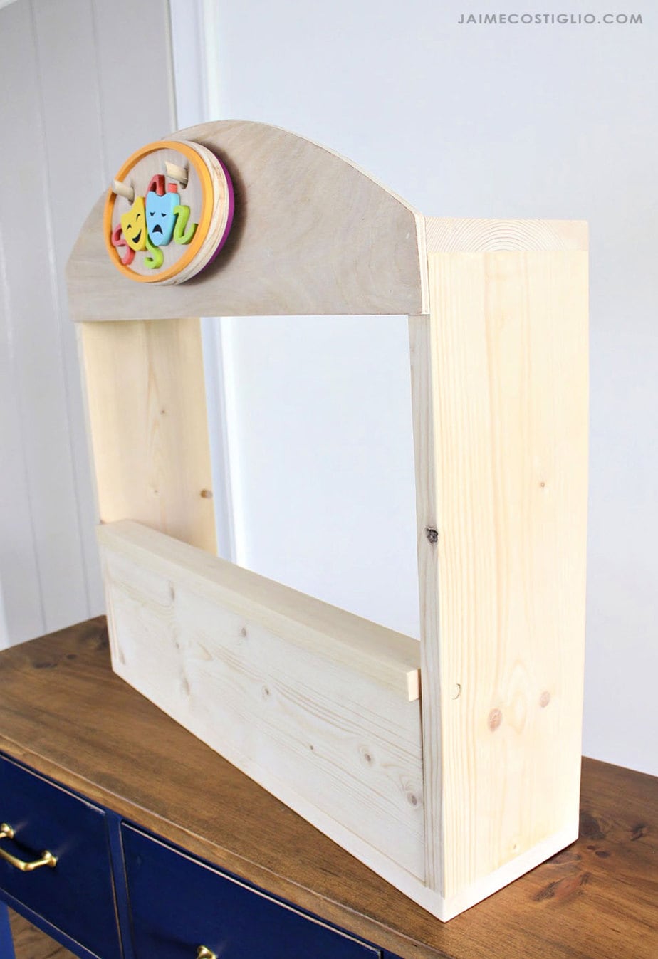 kids play puppet theater