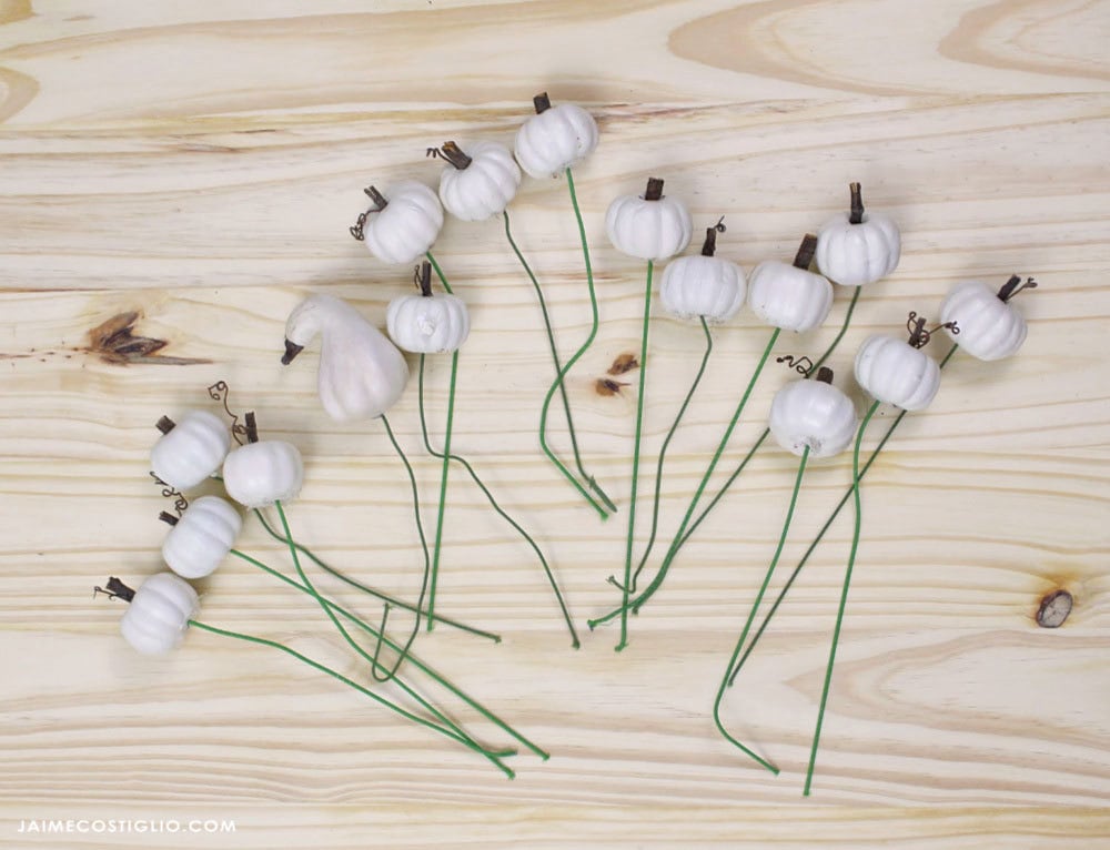 mini white pumpkins on floral stems