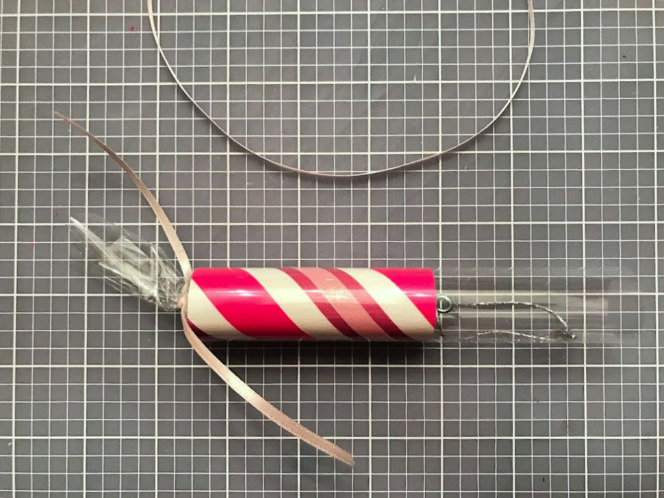 wrapping wood candy ornaments in cellophane