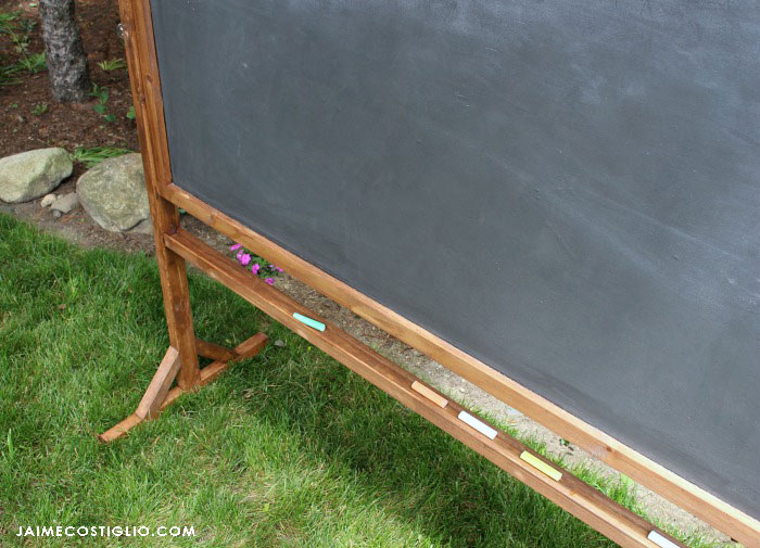 framed chalkboard with chalk ledge