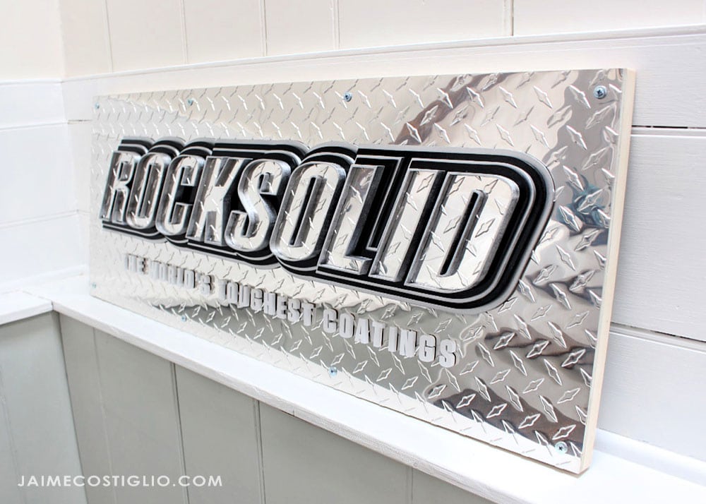 textured metal scroll saw sign