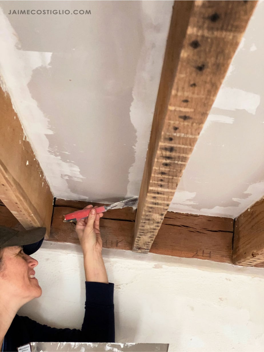 applying joint compound to sheetrock
